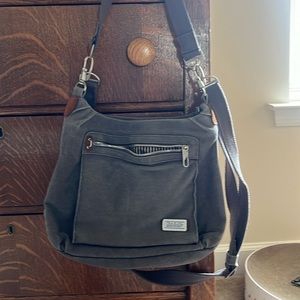 Traveling purse. 10 x 12 x 3. No stains or holes